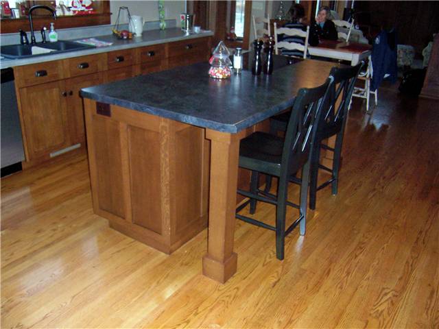  Island with a wood column under the countertop